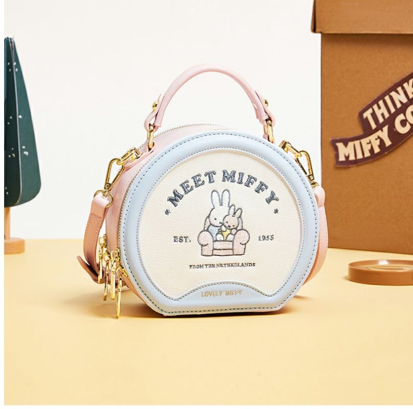 Luxury Bags Japan - アニメミッフィー女性用バッグ新しいスタイルバッグ夏の高級感気質ニッチ小さな丸いバン型ワンショルダークロスボディポータブル